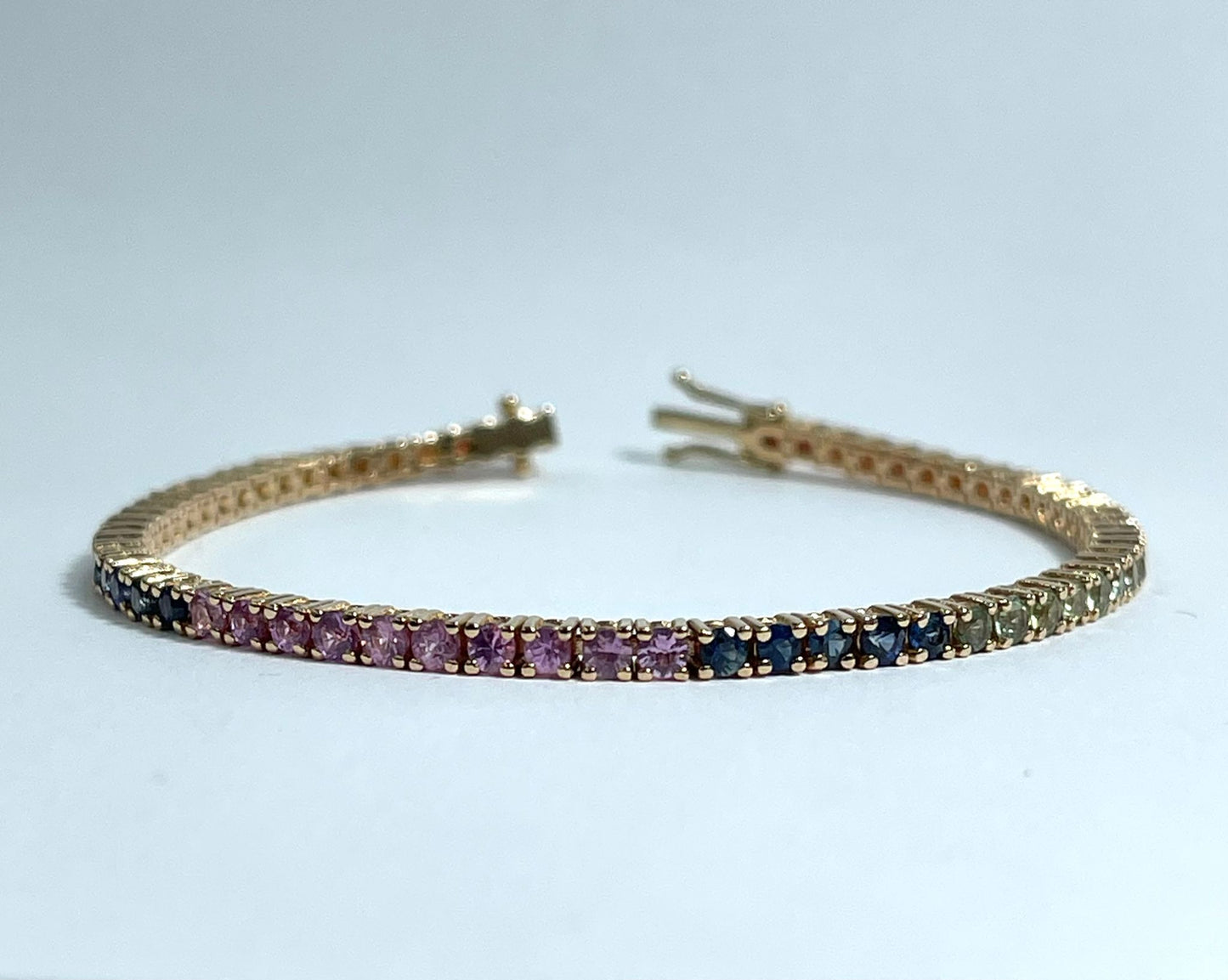PULSERA DE TENIS DE ORO ROSA CON ZAFIROS